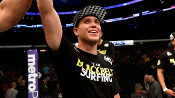 Brian Ortega lands beautiful triangle choke to put Diego Brandao away