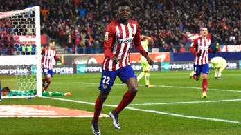 Atletico scrape past Levante to provisionally go top of La Liga