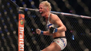 Holly Holm will defend her title before Ronda Rousey rematch