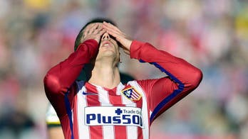 Atletico miss chance to go top of La Liga with draw at Sevilla