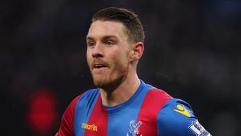 Palace striker Wickham charged with retrospective violent conduct