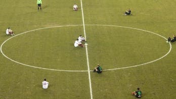 Greek teams stage sit-down protest over migrant deaths