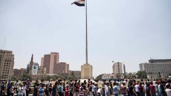 Hundreds march in Cairo, protest cancelled high school exams