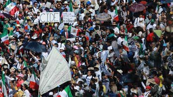 About 20,000 protesters march in Mexico City to send message to Trump administration