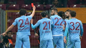 Trabzonspor player shows referee a red card, then gets one of his own