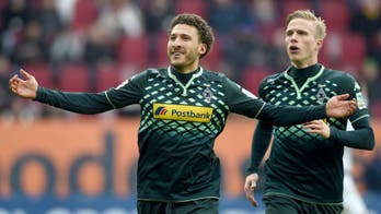 US star Johnson earns Gladbach a point at Augsburg