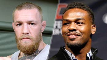 Why is 'company man' Jon Jones throwing shade on Ronda Rousey & Conor McGregor?