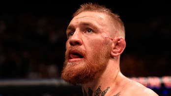 Conor McGregor plans to defend featherweight title next, likely against Aldo or Edgar