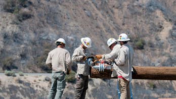 In dry, windy West, crews target flames in several states