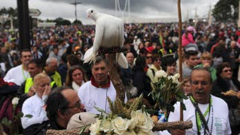 The Latest: Tens of thousands gather for Pope's Fatima visit
