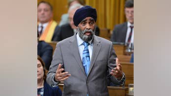 Canada defense minister sorry for exaggerating military role