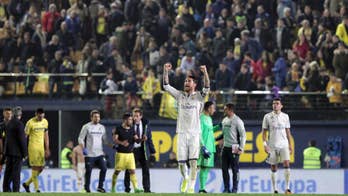 Pique and Ramos in spat as title race heats up in Spain