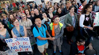 University of North Carolina president says campuses must follow LGBT law