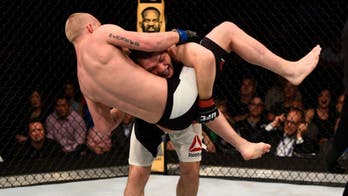 Khabib Nurmagomedov slams opponent after carrying him halfway across the Octagon