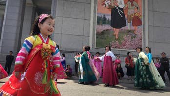 North Korea celebrates as South Korea, US keep watch