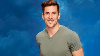 One kiss is 'awkward', another's a touchdown for new 'Bachelorette'