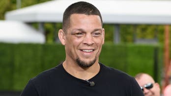 Nate Diaz presented an award for his win over Conor McGregor