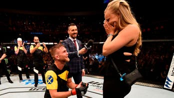 Alexander Gustafsson proposes to his girlfriend in the Octagon following knockout win