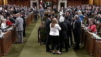 Opposition accuses Canada PM Trudeau of elbowing lawmaker