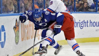Dominic Moore's goal helps Rangers beat Lightning 5-2 to end 8-game road skid