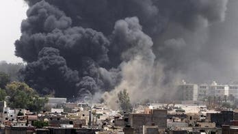 Qaddafi Vows to Fight to Death After Tripoli Bombarded by Airstrikes