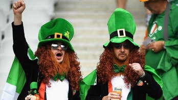 Awesome Irish fans sing lullabies to French baby on a train