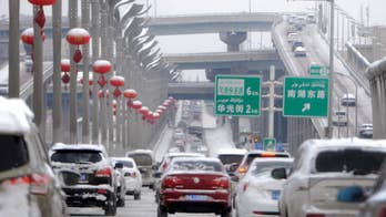 Prefecture in China's Xinjiang to track cars by satellite