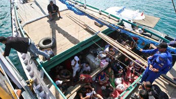 AP Explains: Why is Australia-US refugee deal contentious