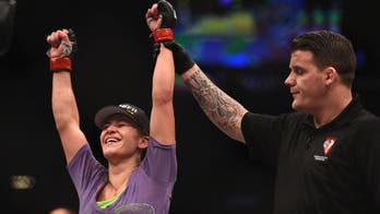 Miesha Tate comes from behind, wins decision and earns title shot