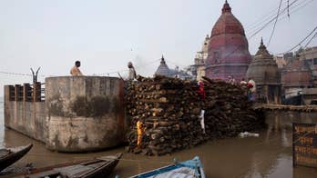 AP PHOTOS: Ganges overflows its banks in India holy town