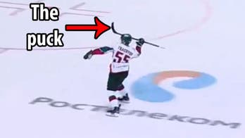 Hockey player scores ridiculous goal that defies gravity