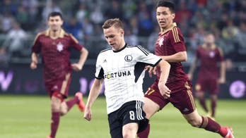 Legia awarded win after crowd trouble stops Europa League match