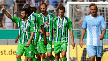 Wolfsburg begin DFB-Pokal defense with comprehensive win; Bayer cruise