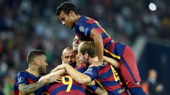 Messi's free kicks highlight Barcelona's wild Super Cup win vs. Sevilla
