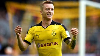 Dortmund dominate Gladbach to open campaign with emphatic win