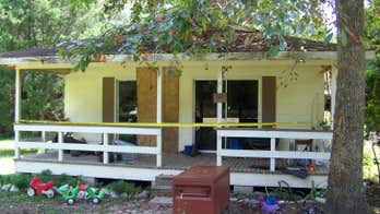 Suspect in Alabama house murders used ax, gun in middle of night, police say