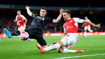 Goalkeeper heroics hold Arsenal, Liverpool to a scoreless draw
