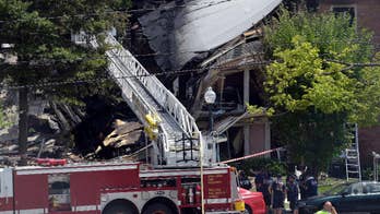 Gas smell investigated in probe of deadly apartment fire