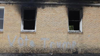 FBI probing 'Vote Trump' tag, fire at black church