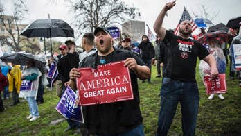 The Latest:  30 gather at pro-Trump rally in Indianapolis