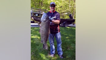 Michigan fisherman sets new record with 48-pound black buffalo fish