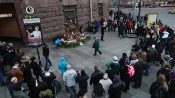 Investigators search suspected Russian suicide bomber's home