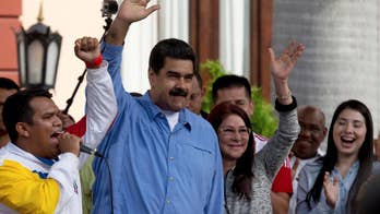 Venezuela President Maduro threatens to sue JPMorgan