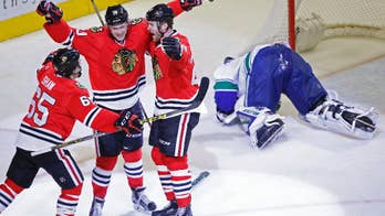 Kane's points streak at 26 games, Crawford gets 2nd straight shutout, Blackhawks beat Canucks