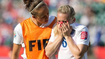 Bassett's own goal in stoppage time lifts Japan to 2-1 win over England in World Cup semifinal
