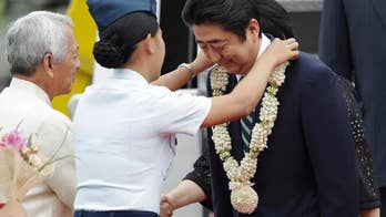Abe starts 4-nation trip with visit to Philippines