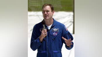 Former space shuttle commander indicted in traffic deaths of 2 Alabama girls