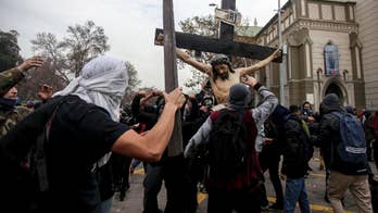 Chile: Catholic church looted by hooded vandals
