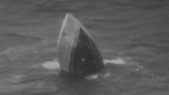 'Rogue waves' prompt dramatic rescue after fishing boat with 8 aboard sinks in Hawaii