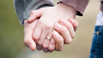 Wisconsin firefighter proposes to girlfriend and her daughter at parade